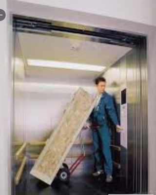 Elevador de carga de Warehouse de la impulsión del sistema de pesos americano con el sitio 3000KG de la máquina